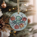 a christmas ornament hanging from a christmas tree