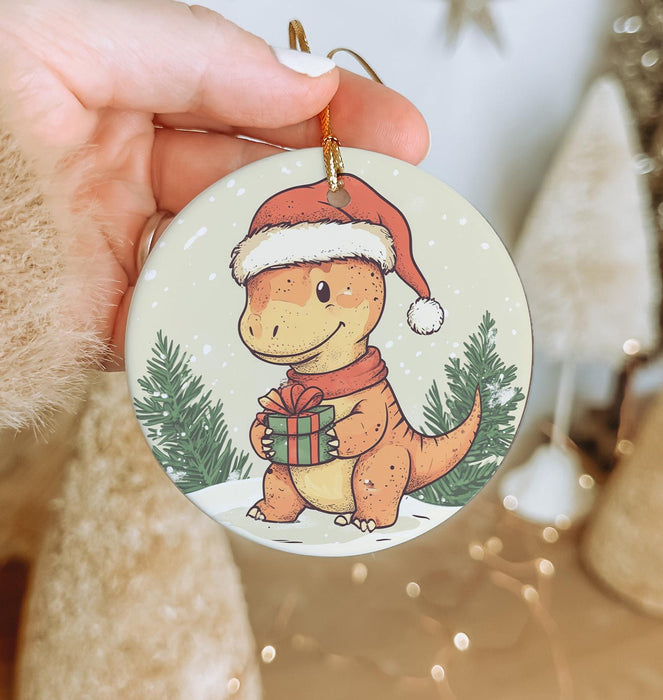 a person holding a christmas ornament in their hand