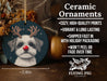 a ceramic ornament with a dog wearing reindeer antlers