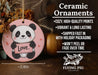 a ceramic ornament with a panda holding a love sign