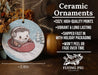 a ceramic ornament with a hedge riding a sled