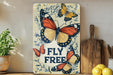 a picture of a sign that says fly free