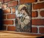 a picture of a woman with a dove on a brick wall