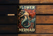 a book with a picture of a mermaid on it