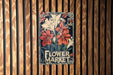 a flower market sign on a wooden wall