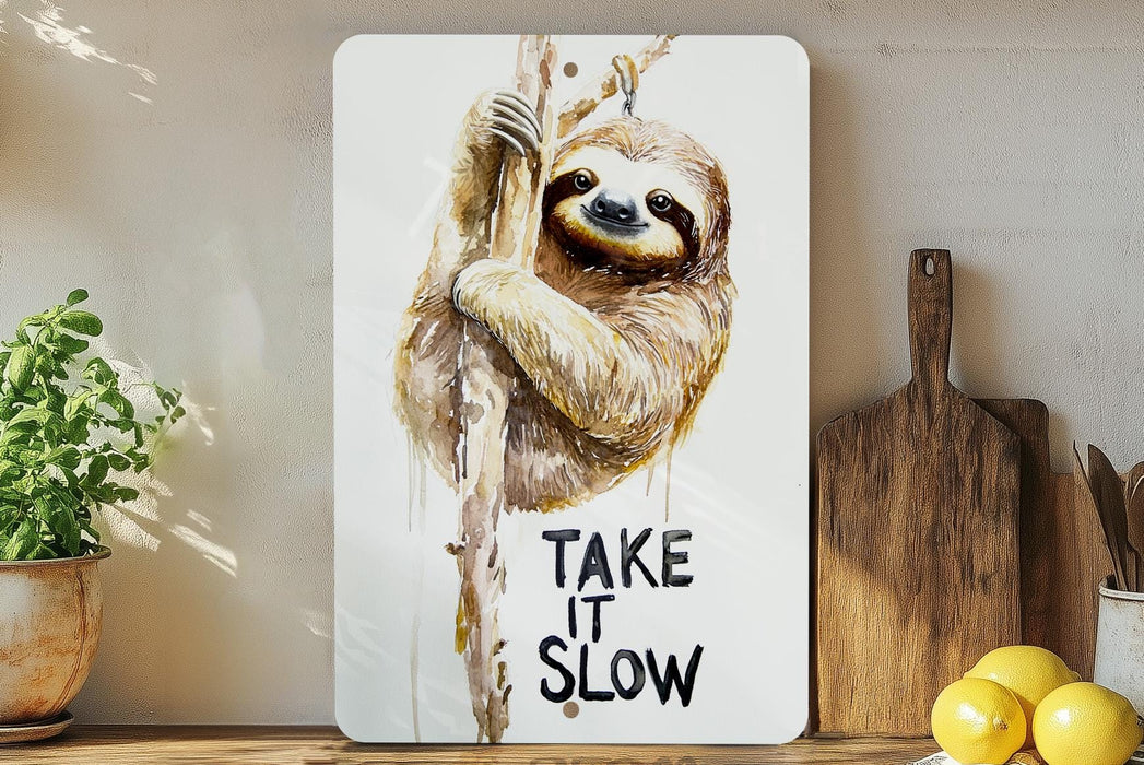 a picture of a sloth hanging on a wall