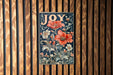 a wooden wall with a painting of flowers on it