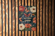 a butterfly garden book on a wooden wall