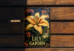 a sign on a wooden bench that says lily garden