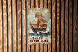 a sign on a wooden wall that says sail the seven seas