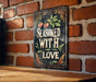 a sign on a brick wall that says seasoned with love