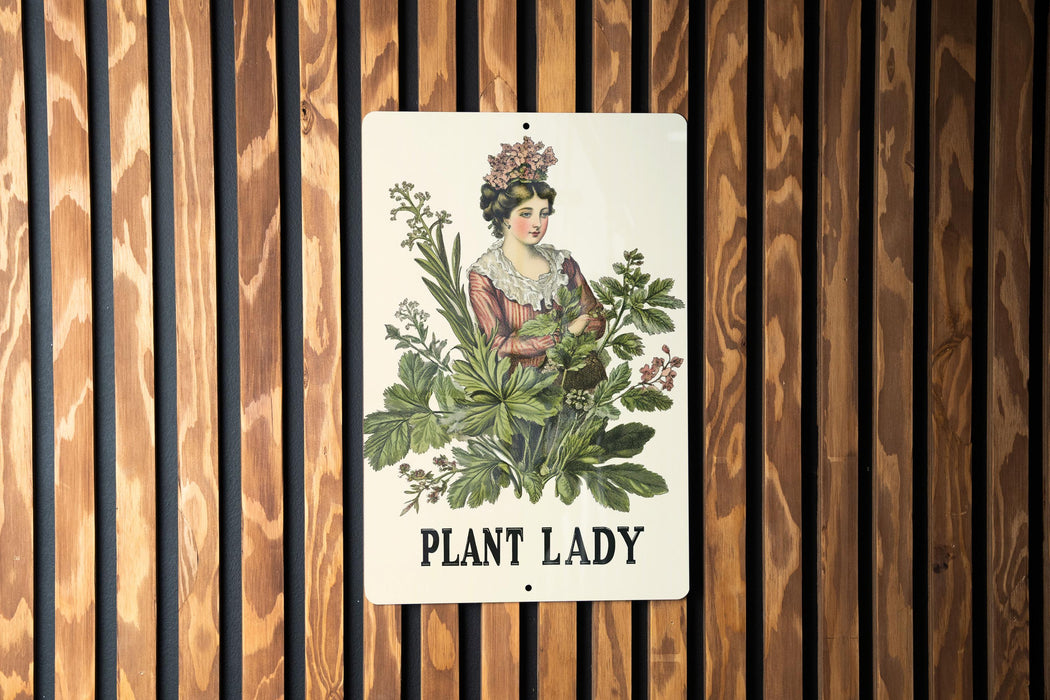 a plant lady sign on a wooden wall
