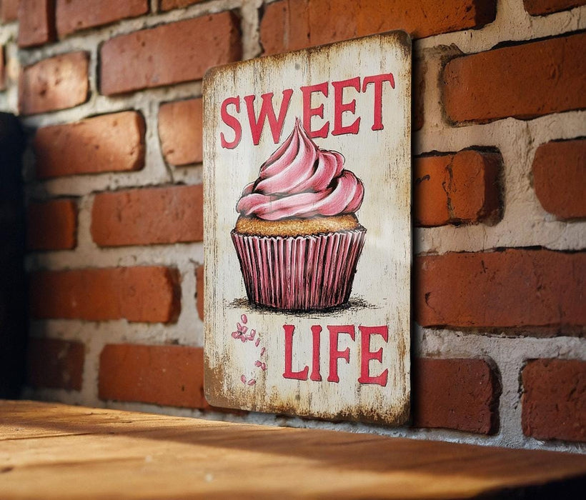 a sign on a brick wall that says sweet life