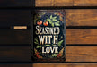 a sign that says seasoned with love on it