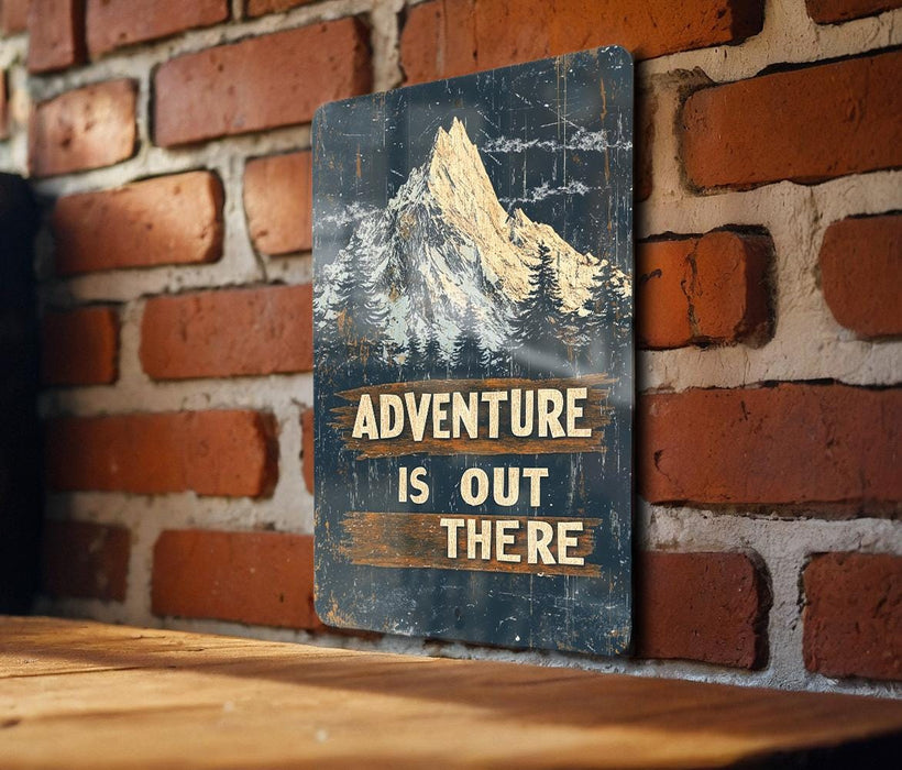 a sign on a brick wall that says adventure is out there