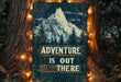 a sign that says adventure is out there