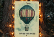 a picture of a hot air balloon on a tree