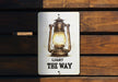 a light the way sign on a wooden wall