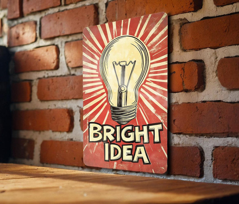a bright idea sign on a brick wall