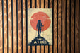 a sign on a wooden wall that says take a hike