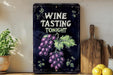 a painting of a bunch of grapes on a shelf