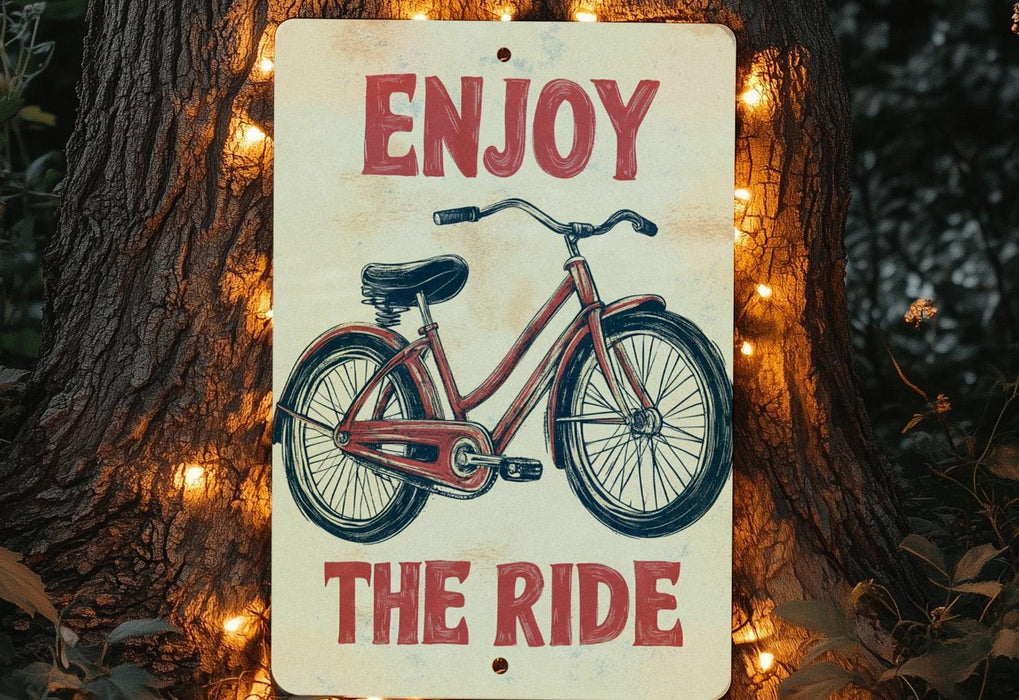 a sign that says enjoy the ride with a bicycle on it