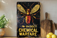 a metal sign with a picture of a bee on it