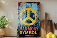 a yellow and blue sign sitting on top of a wooden table