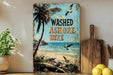 a picture of a sign that says washed ashore here
