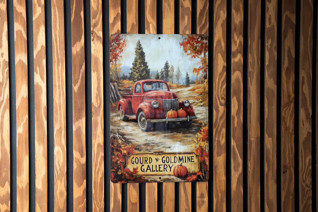 a painting of a red truck with pumpkins on it