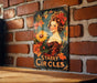 a picture of a woman with flowers on a brick wall