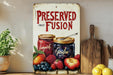 a painting of fruit is displayed on a shelf