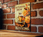 a sign on a brick wall with a cup of coffee