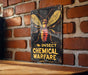 a sign on a brick wall that says insect chemical warfare
