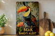 a painting of a toucan bird on a shelf