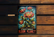 a wooden bench with a sign on it that says, other worldly bloom planet
