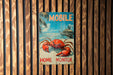 a picture of a crab on a wooden wall