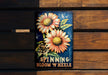 a sign on a wooden bench that says spinning bloom wheels