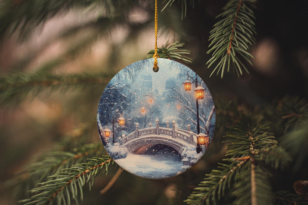 a glass ornament hanging from a christmas tree
