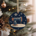a christmas ornament with a sewing machine on it
