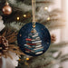 a christmas tree ornament decorated with books