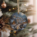 a christmas ornament hanging from a christmas tree