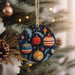 a christmas ornament hanging from a christmas tree
