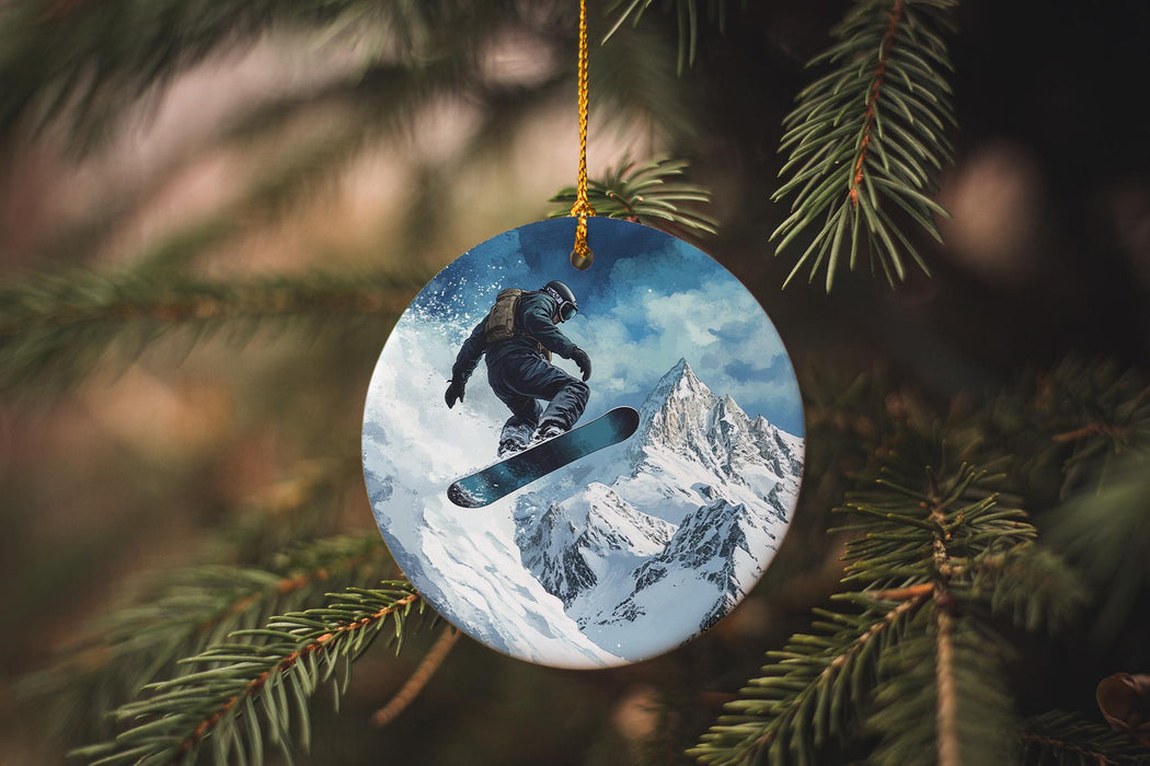 a snowboarder ornament hanging from a christmas tree