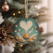 a ceramic ornament hanging from a christmas tree