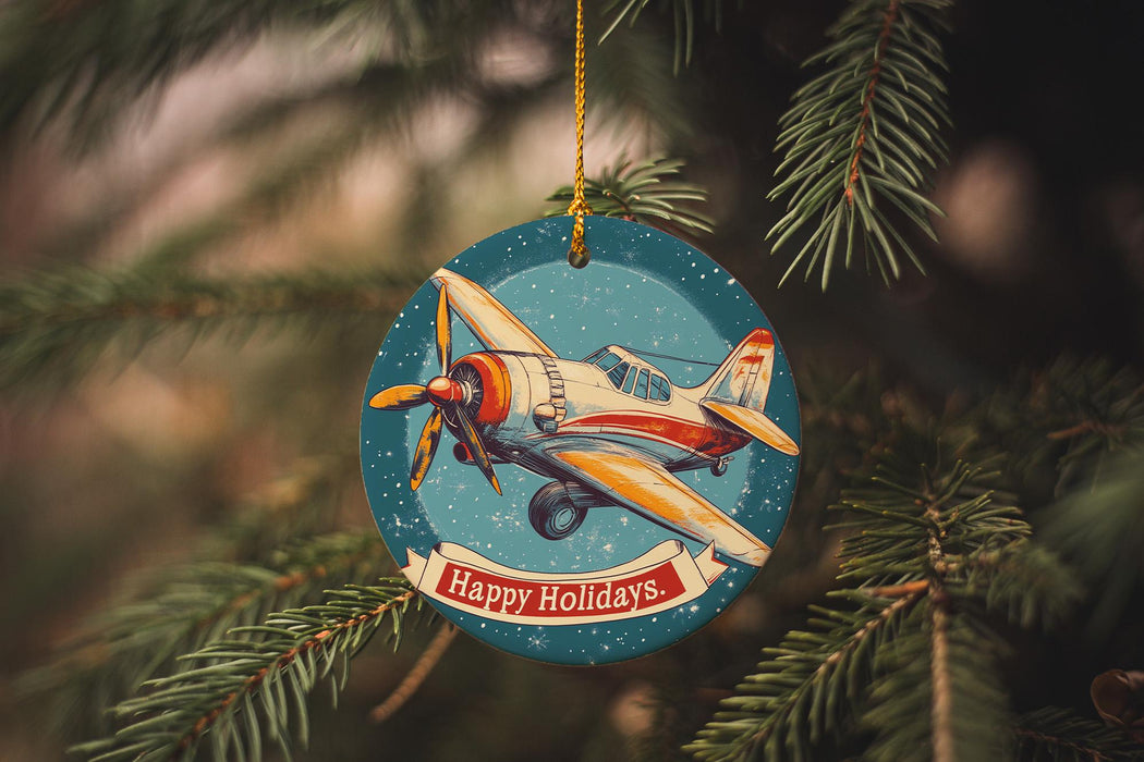 a christmas ornament hanging from a christmas tree