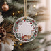 a christmas ornament hanging from a christmas tree