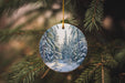 a christmas ornament hanging from a tree