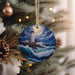 a christmas ornament hanging from a christmas tree