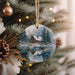 a christmas ornament hanging from a christmas tree